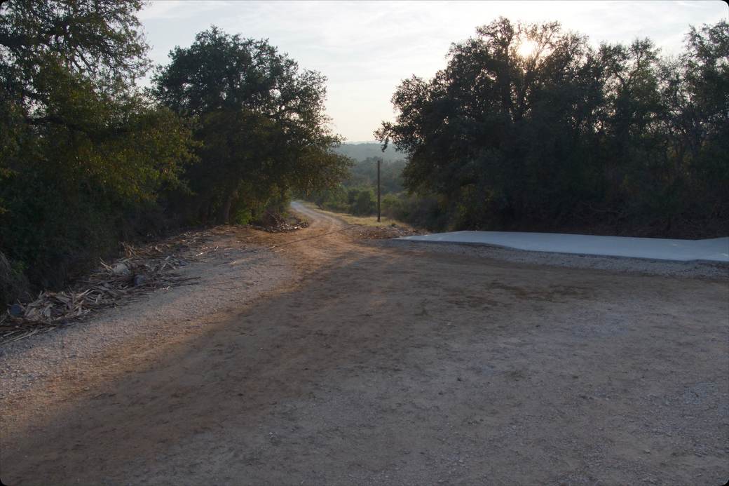 Cleared building pad with trees saved